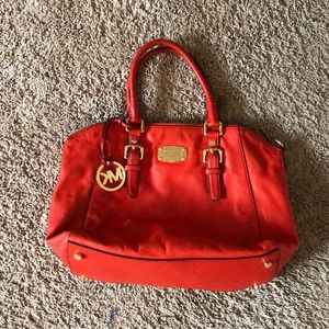 Authentic red leather Michael Kors handbag